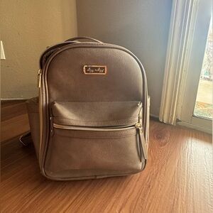 NWOT Itzy Ritzy Diaper Bag mini taupe with new changing pad